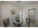 Bright dining room with seating for four with easy access to the outdoors at 1444 E Boston St, Chandler, AZ 85225