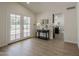Bright entryway with light wood floors, stylish table, and double doors to the exterior at 1444 E Boston St, Chandler, AZ 85225