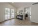 Welcoming entryway with light floors, stylish table, and double doors to the exterior at 1444 E Boston St, Chandler, AZ 85225
