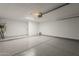 Clean two car garage with durable epoxy flooring and a convenient service door at 1444 E Boston St, Chandler, AZ 85225
