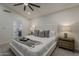 Bright, airy main bedroom features ensuite bath, neutral palette, and stylish furnishings at 1444 E Boston St, Chandler, AZ 85225