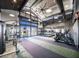 Spacious gym featuring treadmills, elliptical machines, and weight-lifting equipment at 16981 W Cameron Dr, Surprise, AZ 85388