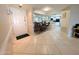 Welcoming entryway featuring an open layout connecting to the kitchen and dining areas at 17404 N 99Th Ave # 126, Sun City, AZ 85373