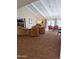 Inviting living room with cozy seating, fireplace, and an American flag, perfect for relaxation at 17404 N 99Th Ave # 126, Sun City, AZ 85373