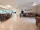 Spacious open-concept living room adjacent to the kitchen and dining area at 17404 N 99Th Ave # 126, Sun City, AZ 85373