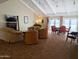 Inviting living room with cozy seating, fireplace, and an American flag, perfect for relaxation at 17404 N 99Th Ave # 126, Sun City, AZ 85373