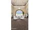 Grand lobby with high ceilings, comfortable seating, and elegant arched windows overlooking the outdoors at 17404 N 99Th Ave # 126, Sun City, AZ 85373