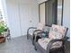 Charming patio features cozy seating arrangements perfect for enjoying outdoor relaxation at 17404 N 99Th Ave # 126, Sun City, AZ 85373