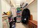 Functional walk-in closet with shelving and hanging storage solutions for optimal organization at 17404 N 99Th Ave # 126, Sun City, AZ 85373