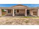 Backyard featuring a covered patio, creating an inviting outdoor living space at 17649 W Buchanan St, Goodyear, AZ 85338