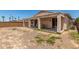 A spacious backyard with covered patio, ideal for outdoor activities at 17649 W Buchanan St, Goodyear, AZ 85338