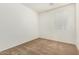 Empty bedroom featuring neutral paint, carpet, and natural light from the window at 17649 W Buchanan St, Goodyear, AZ 85338