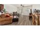 Comfortable living room featuring stylish furniture, hardwood floors, and plenty of natural light, creating a relaxing space at 17649 W Buchanan St, Goodyear, AZ 85338