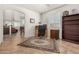 Inviting home office with a large window, wooden desk, and open layout, offering a comfortable and functional workspace at 17649 W Buchanan St, Goodyear, AZ 85338