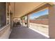 Spacious covered patio for outdoor entertaining and relaxation with a BBQ grill at 17649 W Buchanan St, Goodyear, AZ 85338