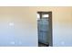 Bathroom showcasing a glass-door shower and neutral wall paint at 18354 W Patrick Ln, Surprise, AZ 85387