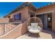 Cozy balcony with wicker chair, offering a relaxing outdoor space with serene views at 20660 N 40Th St # 2124, Phoenix, AZ 85050