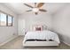 Bright bedroom featuring a ceiling fan and plush bedding for a relaxing atmosphere at 20660 N 40Th St # 2124, Phoenix, AZ 85050