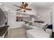 Open-concept living room flows to the kitchen, with high ceilings and abundant natural light at 20660 N 40Th St # 2124, Phoenix, AZ 85050