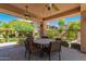 Covered outdoor patio with seating, perfect for enjoying the beautifully landscaped surroundings at 20660 N 40Th St # 2124, Phoenix, AZ 85050