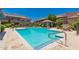 Inviting community pool with crystal-clear water, comfortable lounge chairs, and shaded seating areas at 20660 N 40Th St # 2124, Phoenix, AZ 85050