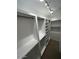 Spacious walk-in closet featuring built-in shelving and ample storage at 20660 N 40Th St # 2124, Phoenix, AZ 85050