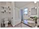 Well-lit bathroom features a granite countertop, modern fixtures, and a tub shower at 21833 N 34Th Ave, Phoenix, AZ 85027