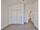 Bright bedroom with a large closet and wood-look floors at 21833 N 34Th Ave, Phoenix, AZ 85027