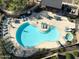 Aerial view of community pool with lounge chairs and spa tub at 2371 W Whisper Rock Trl, Phoenix, AZ 85085