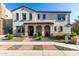 Charming two-story home with a covered front porch and desert landscaping at 2371 W Whisper Rock Trl, Phoenix, AZ 85085