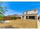 Expansive backyard featuring a sand pit and a view of the surrounding landscape, perfect for outdoor activities and relaxation at 24533 N 19Th Ter, Phoenix, AZ 85024