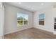 Sunny breakfast nook with wood-style tile floors and views of the backyard at 24533 N 19Th Ter, Phoenix, AZ 85024