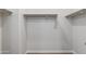 A walk-in closet with shelves and a carpeted floor at 24533 N 19Th Ter, Phoenix, AZ 85024