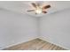 A simple bedroom featuring a ceiling fan and minimalist design at 25 N Cottonwood St # 47, Chandler, AZ 85225