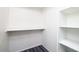 Walk-in closet with built-in shelves for organized storage at 25 N Cottonwood St # 47, Chandler, AZ 85225