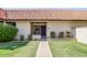 Charming single-story home featuring a well-manicured lawn, desert landscaping, and a classic red tile roof at 25 N Cottonwood St # 47, Chandler, AZ 85225