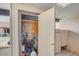 Utility closet with storage shelving, cleaning supplies, water heater and easy access to the covered sun room at 25 N Cottonwood St # 47, Chandler, AZ 85225