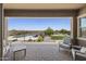 Inviting covered patio featuring elegant pavers with backyard, pool, and plush lawn views at 2514 E Pleasant Ln, Phoenix, AZ 85042