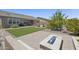 Expansive backyard featuring patio, pool, plush grass, fire pit, and outdoor living at 2514 E Pleasant Ln, Phoenix, AZ 85042