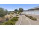 Well-maintained community walkway with decorative desert landscaping at 2514 E Pleasant Ln, Phoenix, AZ 85042