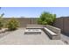 Beautiful backyard fire pit with ample seating and desert landscaping at 2514 E Pleasant Ln, Phoenix, AZ 85042