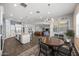 Open-concept living space with a kitchen, dining area, and living room, perfect for modern living and entertaining at 2514 E Pleasant Ln, Phoenix, AZ 85042