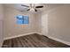 Bedroom featuring a ceiling fan, ample natural light, and neutral tones for a calm and inviting space at 2518 E Flower E St, Phoenix, AZ 85016
