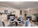 Open concept dining area with modern table setting, and views to living room and kitchen at 2518 E Flower E St, Phoenix, AZ 85016