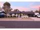 Charming single-story home with a covered carport, well-maintained landscaping, and cozy curb appeal at 2518 E Flower E St, Phoenix, AZ 85016