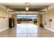 Spacious garage with a view of the home's front exterior at 26161 W Siesta Ln, Buckeye, AZ 85396