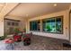 Inviting patio with comfortable seating and well-manicured plants at 26161 W Siesta Ln, Buckeye, AZ 85396