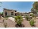 Beautiful backyard featuring a pool, spa, artificial turf, and gravel landscaping at 28263 N Welton Pl, San Tan Valley, AZ 85143