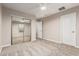 Bright bedroom with carpet floors, ceiling fan, and large mirrored closet doors at 28263 N Welton Pl, San Tan Valley, AZ 85143