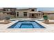 Inviting pool and spa area with pavers and view of backyard at 28263 N Welton Pl, San Tan Valley, AZ 85143